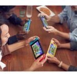 Nintendo Switch Lite coral játékkonzol - Image 9